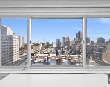 E 65th St - Photo Thumbnail 9
