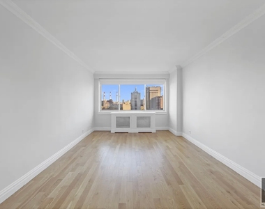 E 65th St - Photo Thumbnail 6