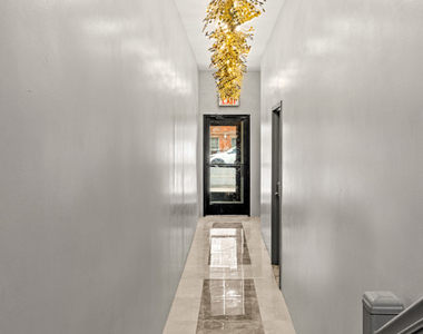 70 Patchen Avenue - Photo Thumbnail 1