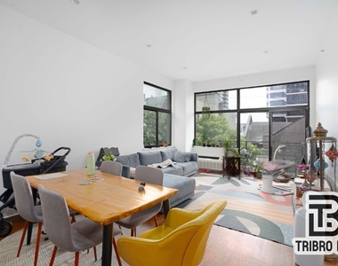 230 E 124th Street - Photo Thumbnail 0