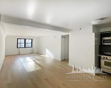 E 39th St - Photo Thumbnail 1