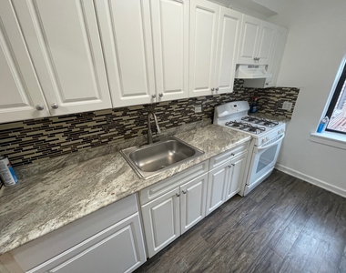 99-58 66th Avenue - Photo Thumbnail 2