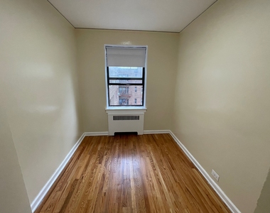 99-58 66th Avenue - Photo Thumbnail 11