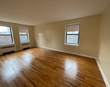 99-58 66th Avenue - Photo Thumbnail 7