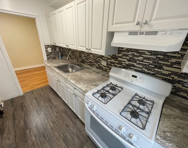 99-58 66th Avenue - Photo Thumbnail 3