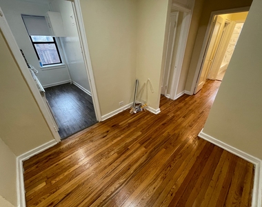 99-58 66th Avenue - Photo Thumbnail 5