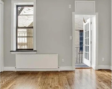 345 E 5th St - Photo Thumbnail 1