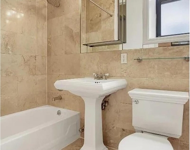 345 E 5th St - Photo Thumbnail 4