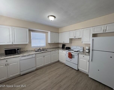 412 Clarence Rowe Avenue - Photo Thumbnail 2