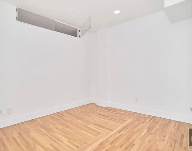 East 37th Street - Photo Thumbnail 13