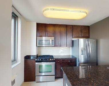 401 E 34th St - Photo Thumbnail 2