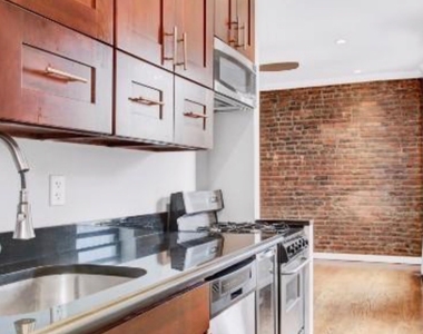 332 West 47th Street - Photo Thumbnail 2