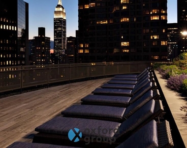 E 39th St. - Photo Thumbnail 11