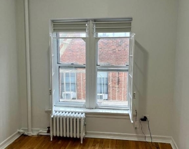 317 E 3rd Street - Photo Thumbnail 1