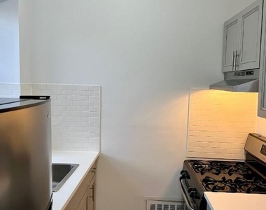 317 E 3rd Street - Photo Thumbnail 3