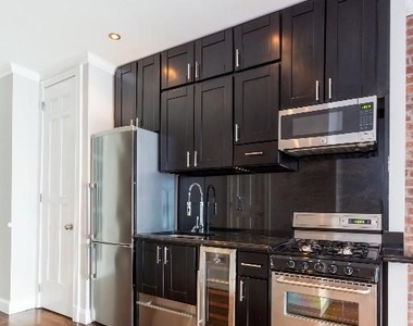 436 West 52nd Street - Photo Thumbnail 1