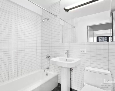 E 39th St - Photo Thumbnail 7