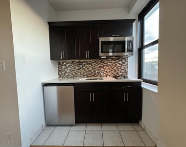 36-14 165th St - Photo Thumbnail 1