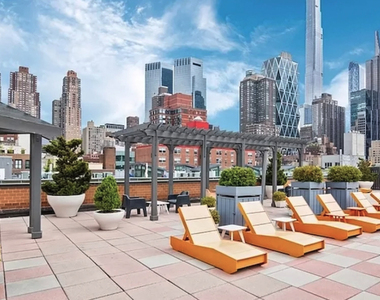  Duplex at 9th Ave & W 53rd St. - Photo Thumbnail 3