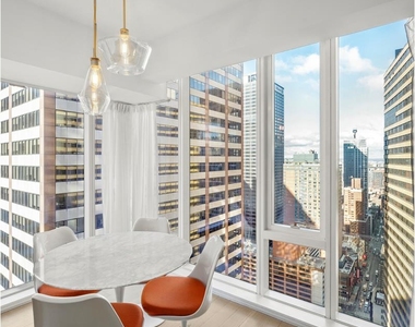 135 W 52nd St - Photo Thumbnail 6