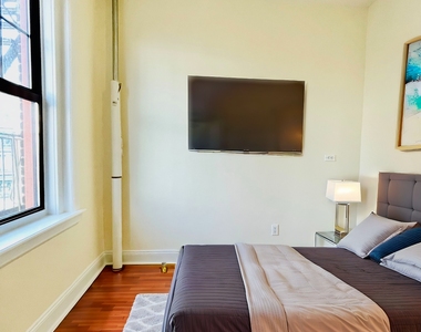 203 West 11th Street - Photo Thumbnail 2