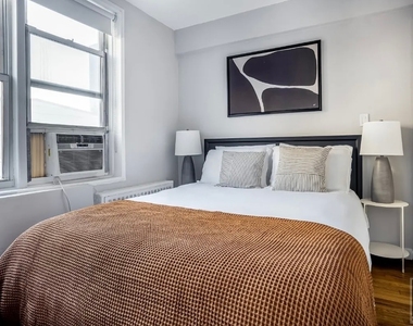East 58 Street - Photo Thumbnail 4