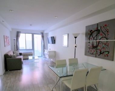 West 48 Street - Photo Thumbnail 1