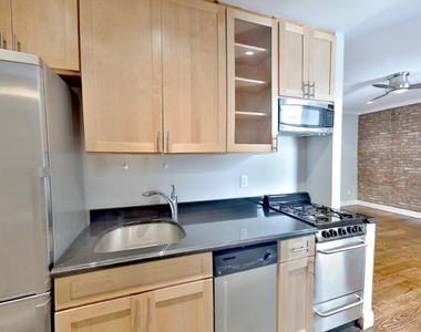 338 East 100th Street - Photo Thumbnail 1