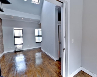 338 East 100th Street - Photo Thumbnail 3