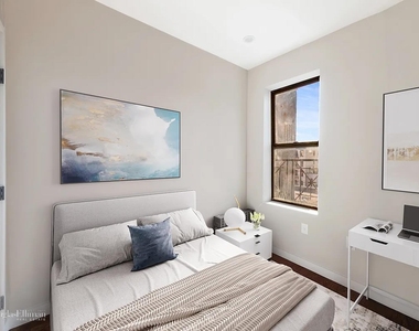 504 E 12th St - Photo Thumbnail 4