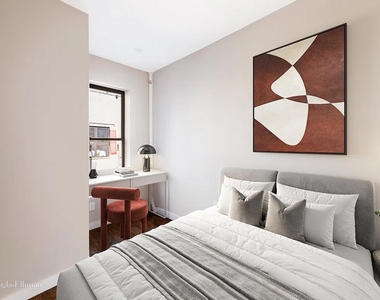 504 E 12th St - Photo Thumbnail 2