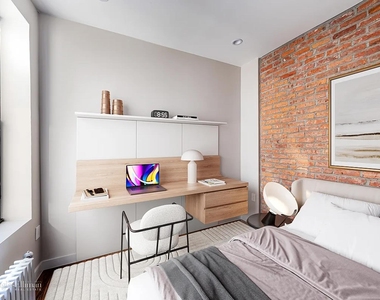 504 E 12th St - Photo Thumbnail 3
