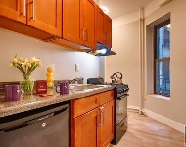 East 11th Street - Photo Thumbnail 0