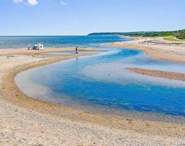 1685 Peconic Lane - Photo Thumbnail 1