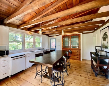 1685 Peconic Lane - Photo Thumbnail 5