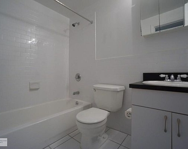 E 55th St - Photo Thumbnail 3