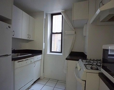E 55th St - Photo Thumbnail 2