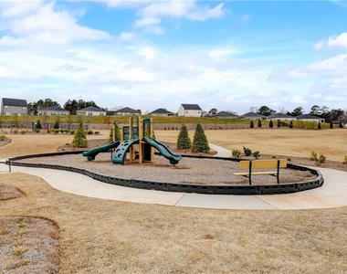 257 Bur Oak Bend - Photo Thumbnail 24