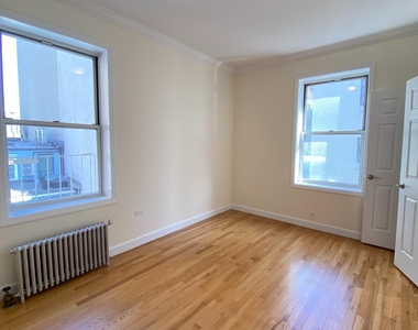 117 W 13th St - Photo Thumbnail 2
