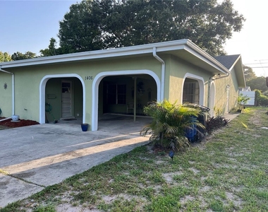 1406 N Saturn Avenue - Photo Thumbnail 1