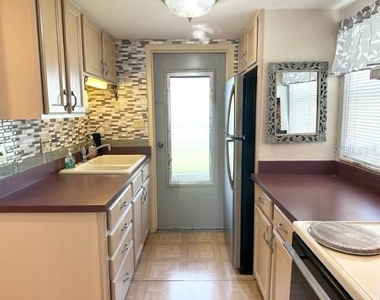 7701 Starkey Road - Photo Thumbnail 2