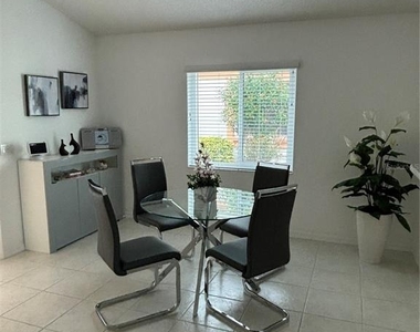 1332 Capri Isles Boulevard - Photo Thumbnail 6