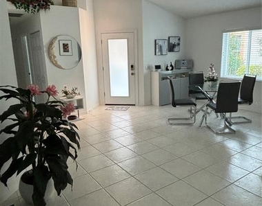1332 Capri Isles Boulevard - Photo Thumbnail 5