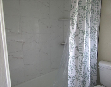 7008 W Country Club Drive N - Photo Thumbnail 4