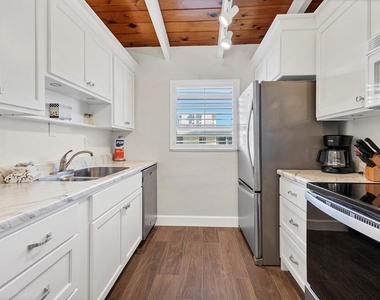 6006 Midnight Pass Road - Photo Thumbnail 9