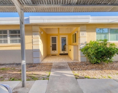 6006 Midnight Pass Road - Photo Thumbnail 1