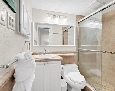 6006 Midnight Pass Road - Photo Thumbnail 16