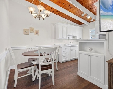 6006 Midnight Pass Road - Photo Thumbnail 11