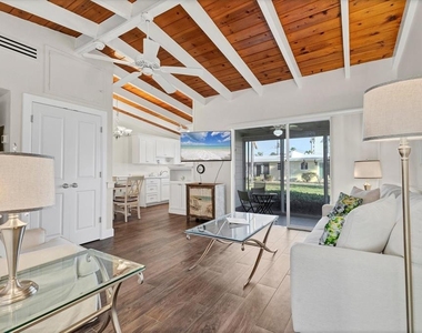 6006 Midnight Pass Road - Photo Thumbnail 2