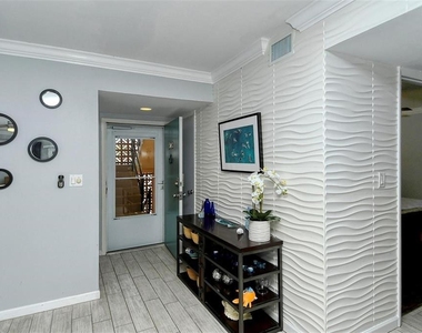 1215 S Portofino Drive N - Photo Thumbnail 3